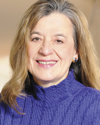 woman in a purple sweater