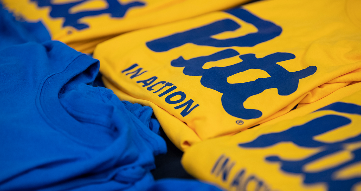 Blue and yellow Pitt shirts