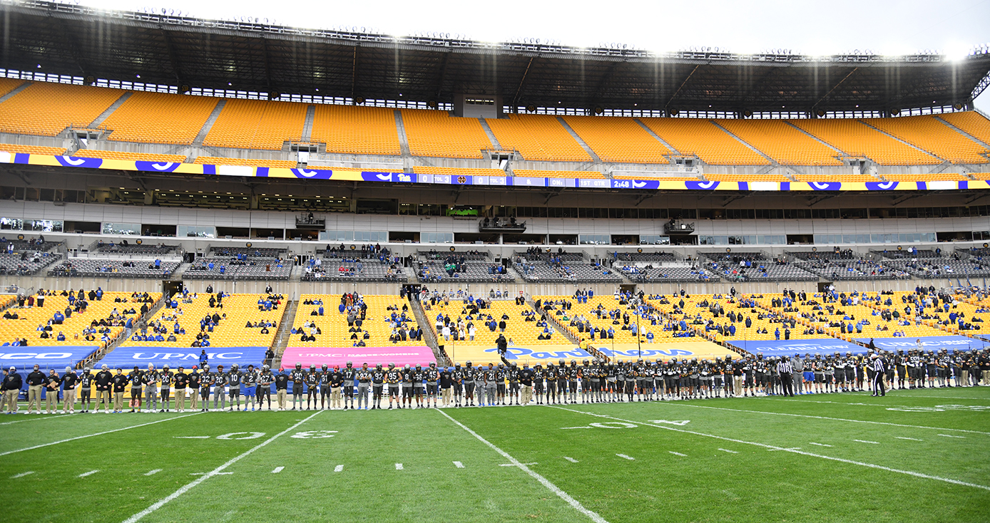 A stadium with socially distanced fans in the seats