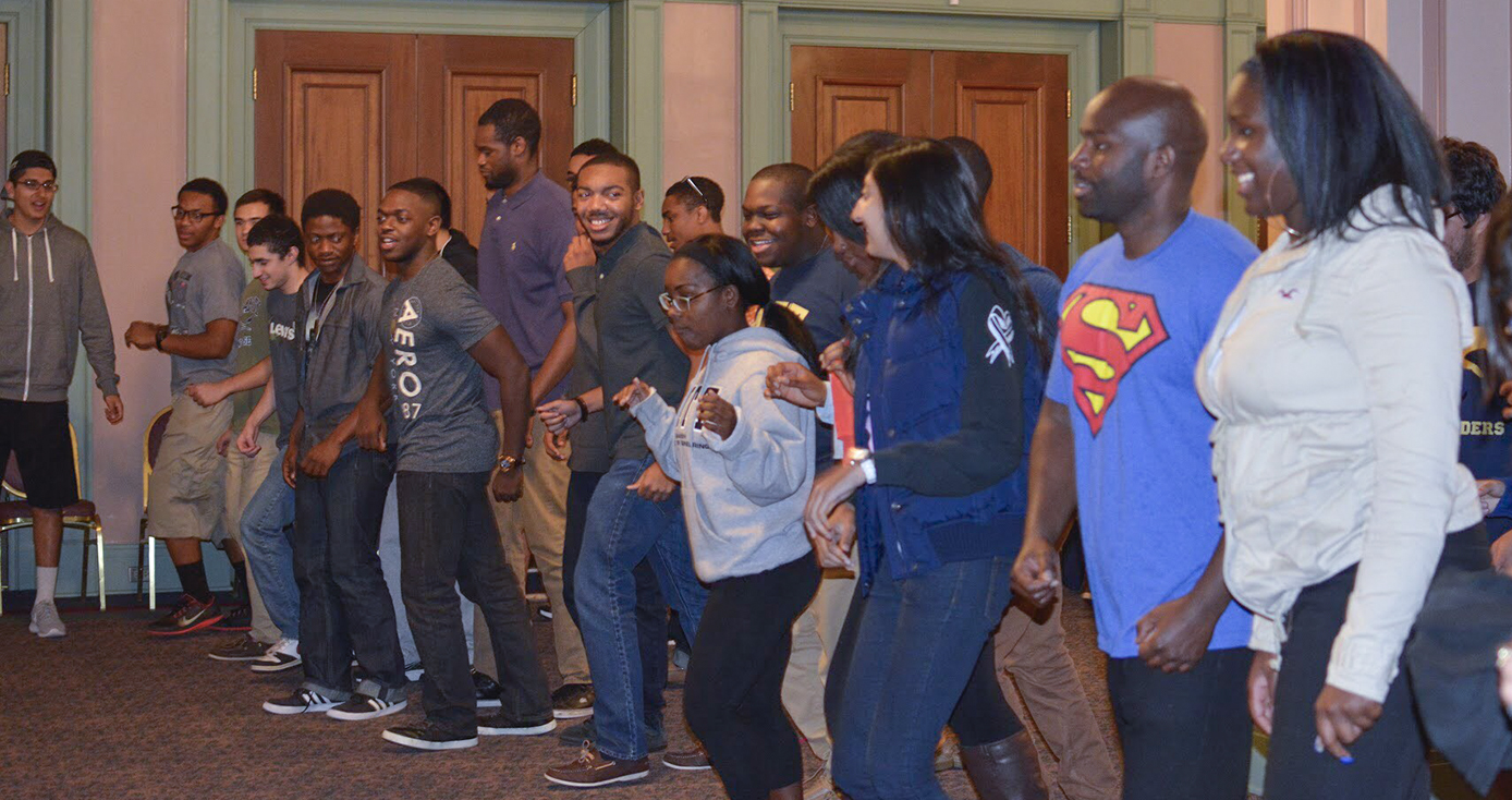 a group of students dancing in a line