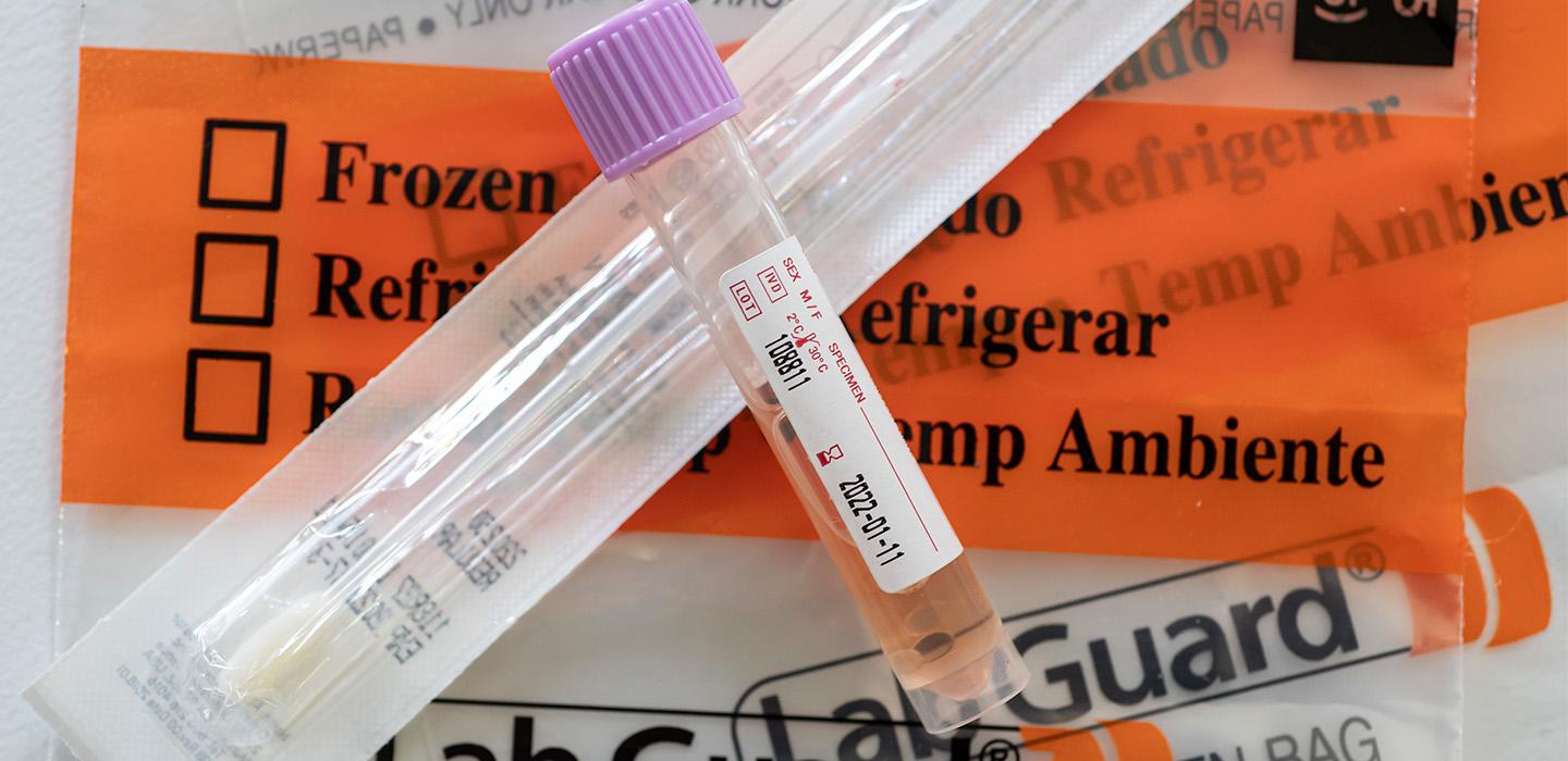 COVID test vial with swab