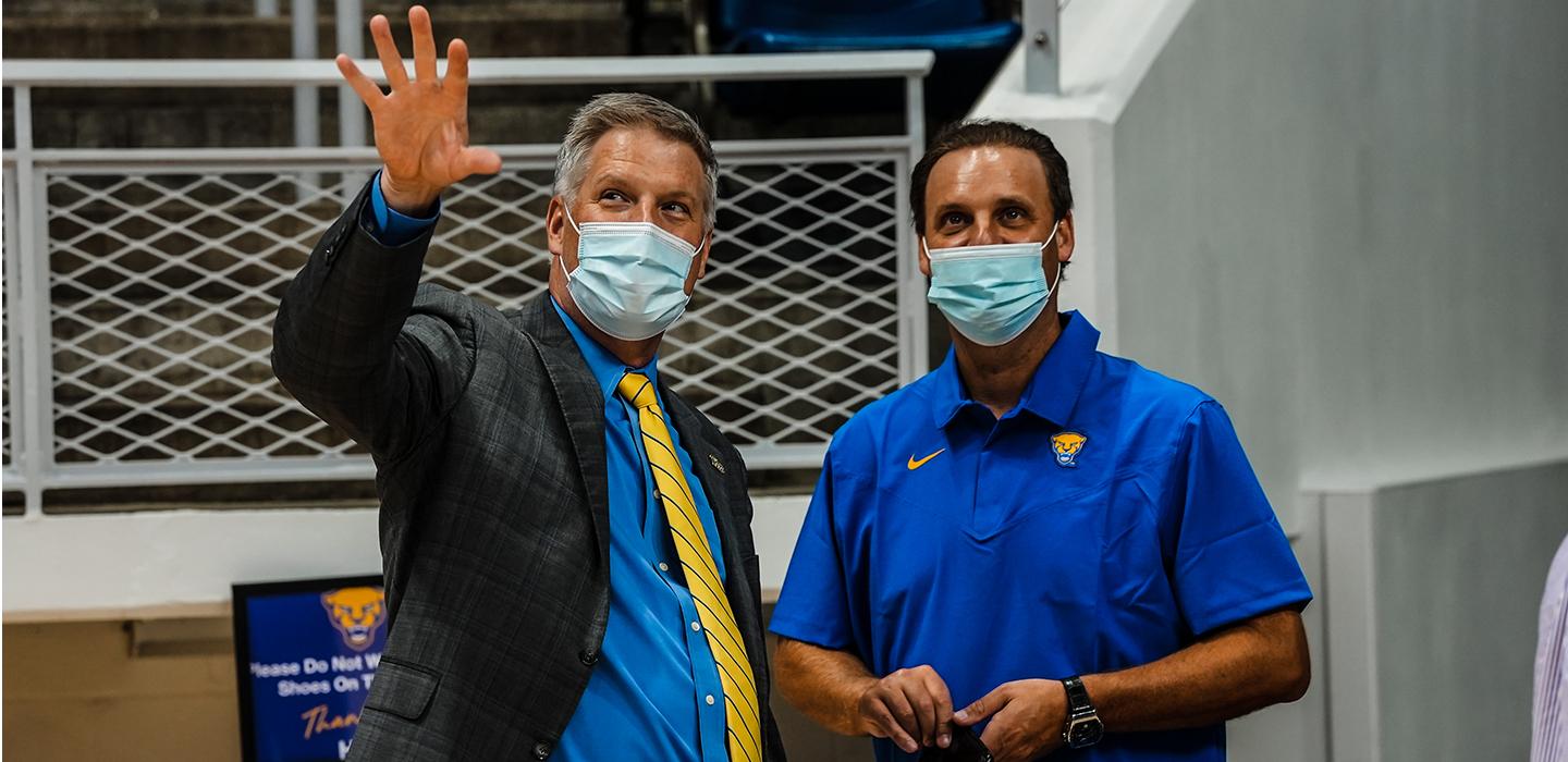 Patrick Gallagher and Chris Bickell, wearing masks