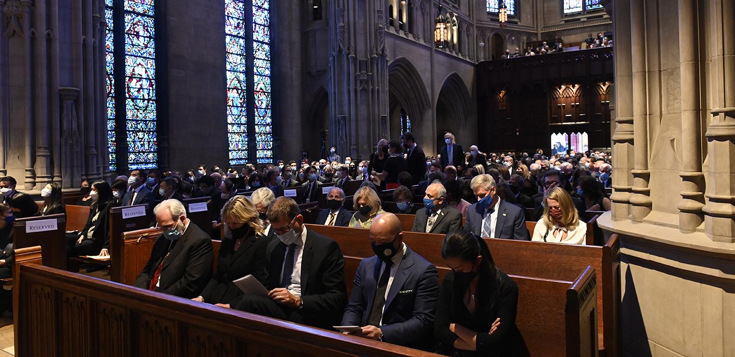 Crowd sitting with masks, attending Freddie Fu's memorial in Heinz Chapel