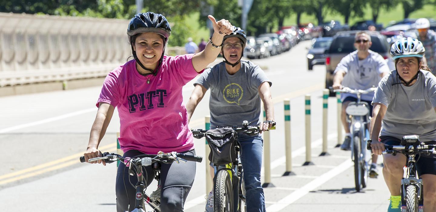 Pitt bicyclists riding around Oakland