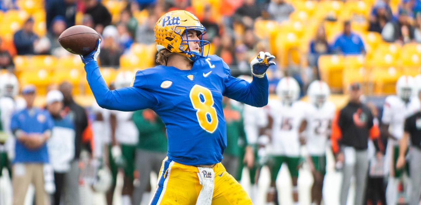 Kenny Pickett throwing ball during football game