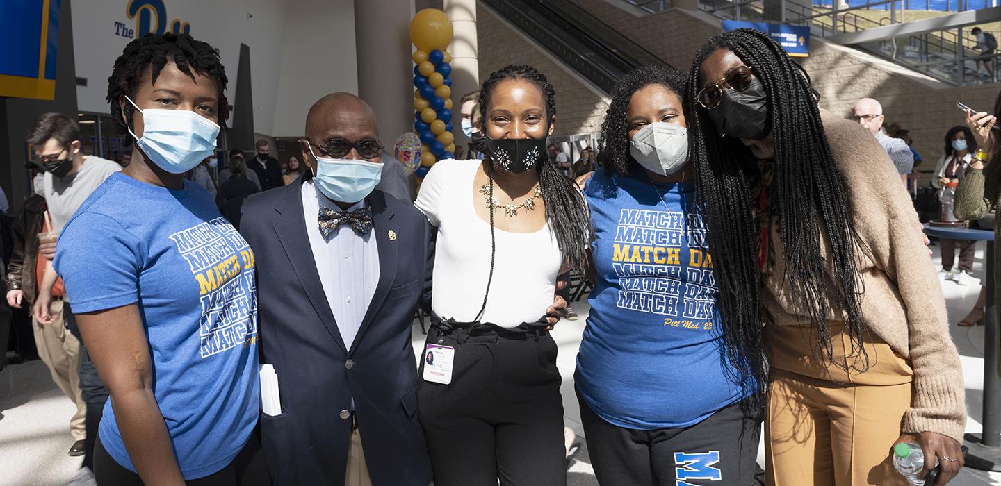 Pitt students posing with each other outside on Match Day