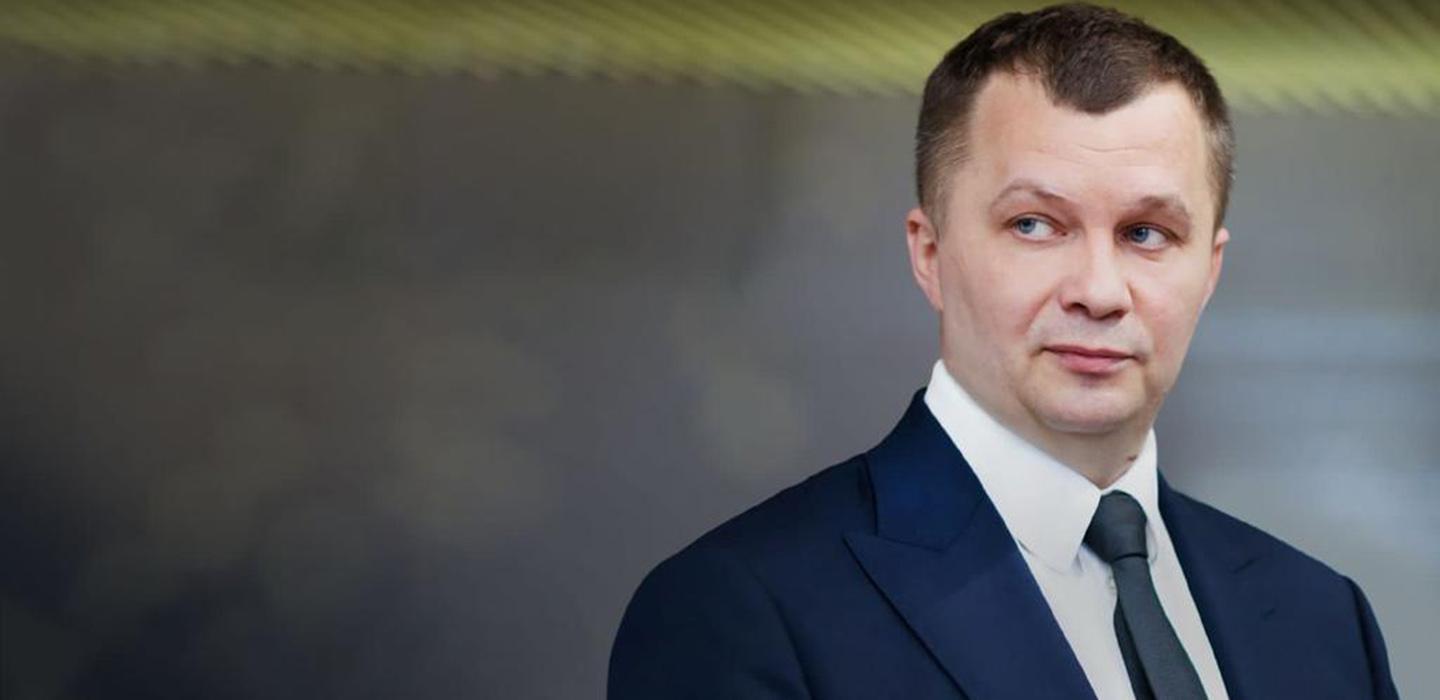 Tymofiy Mylovanov in a suit