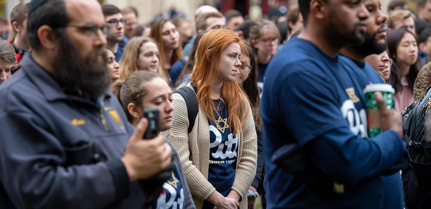 A crowd of people standing together
