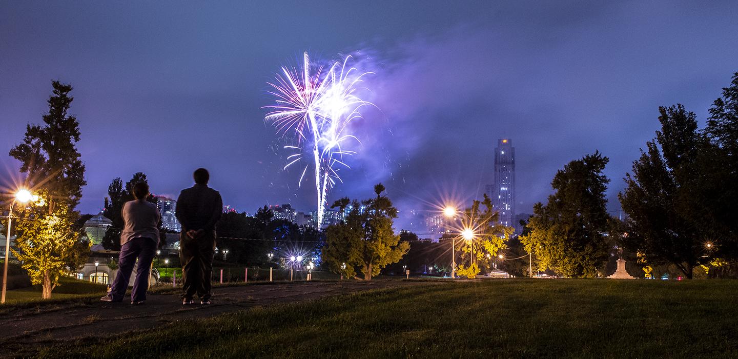 fireworks in oakland with cathedral in background