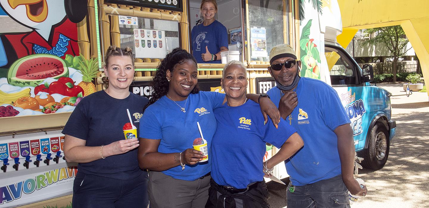 four people in Pitt shirts at an ice cream truck