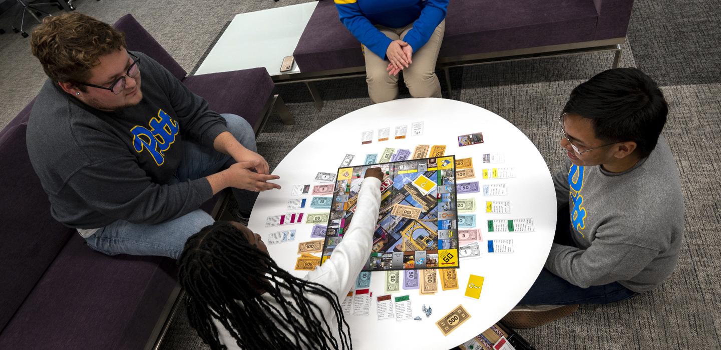 four students playing the new game