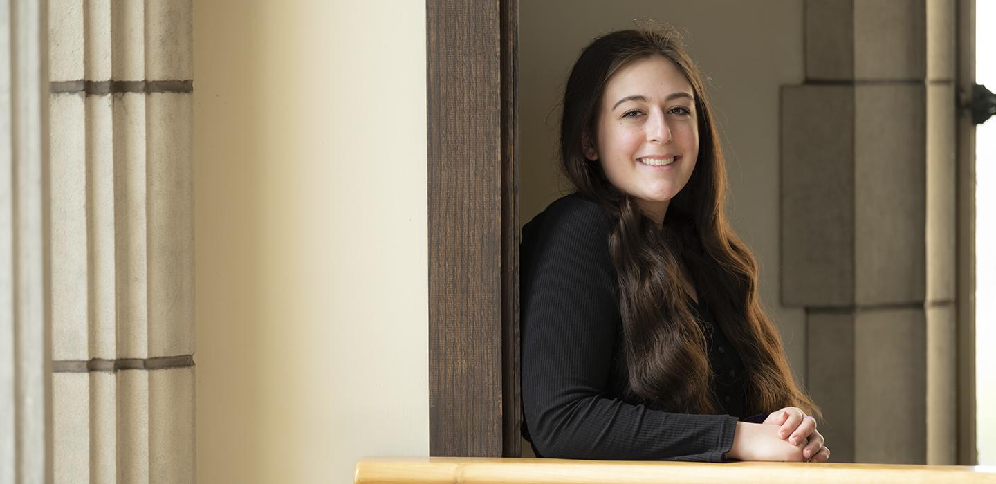 A portrait of Grace Fleury in a black shirt