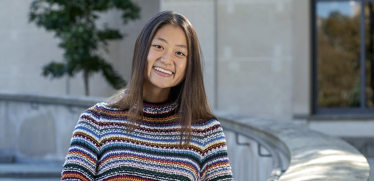 Yunge in front of the Frick Fine Arts building