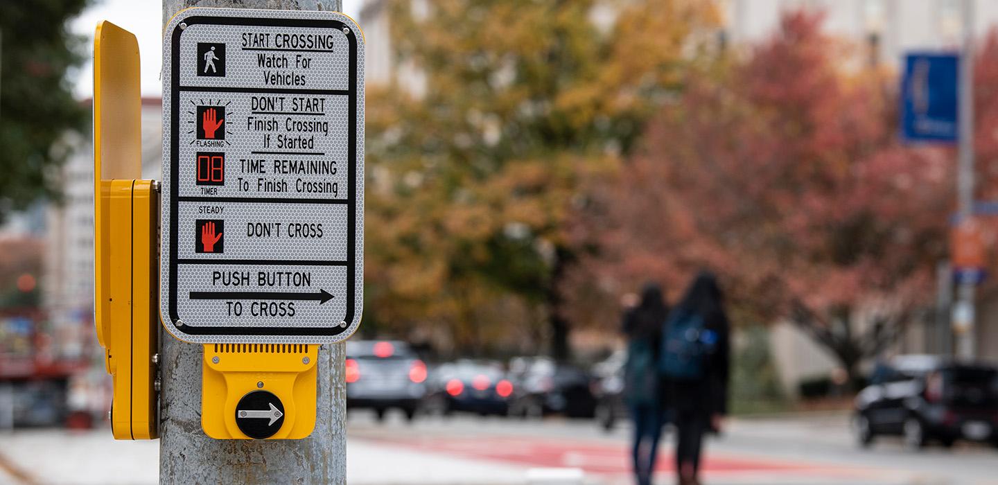 A button at a crosswalk