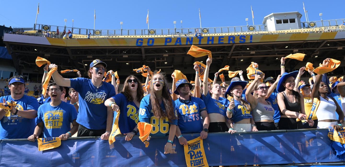 Pitt fans cheer during the Homecoming Football game.