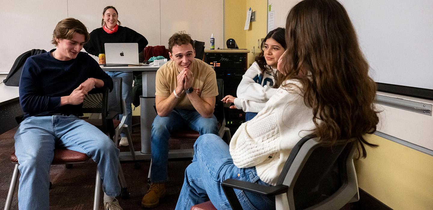 Students in Jennifer Hirsch’s Social Psychology of Reality TV course deliberate.
