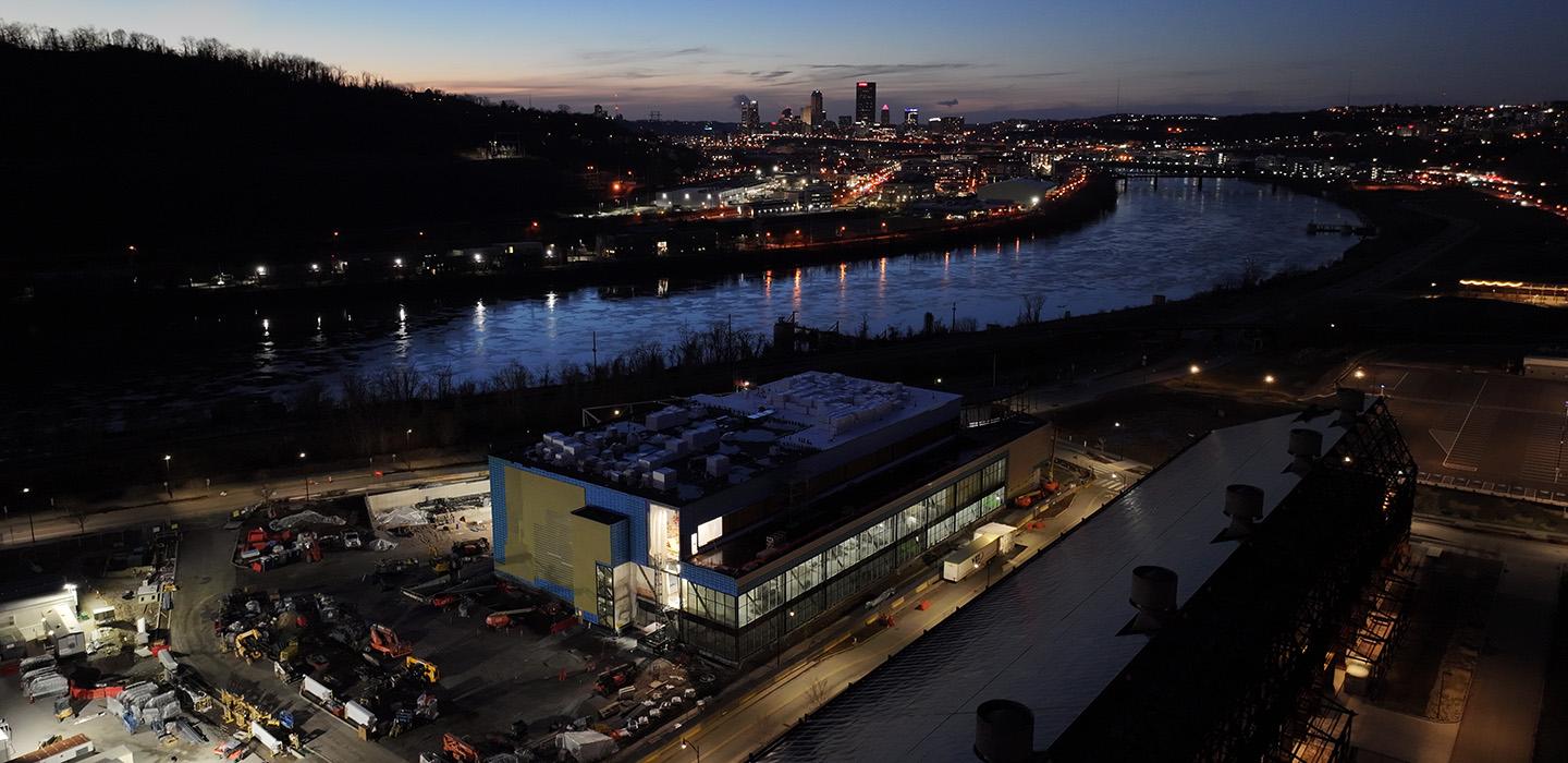 Aerial image of Pitt Bioforge with Pittsburgh skyline in background