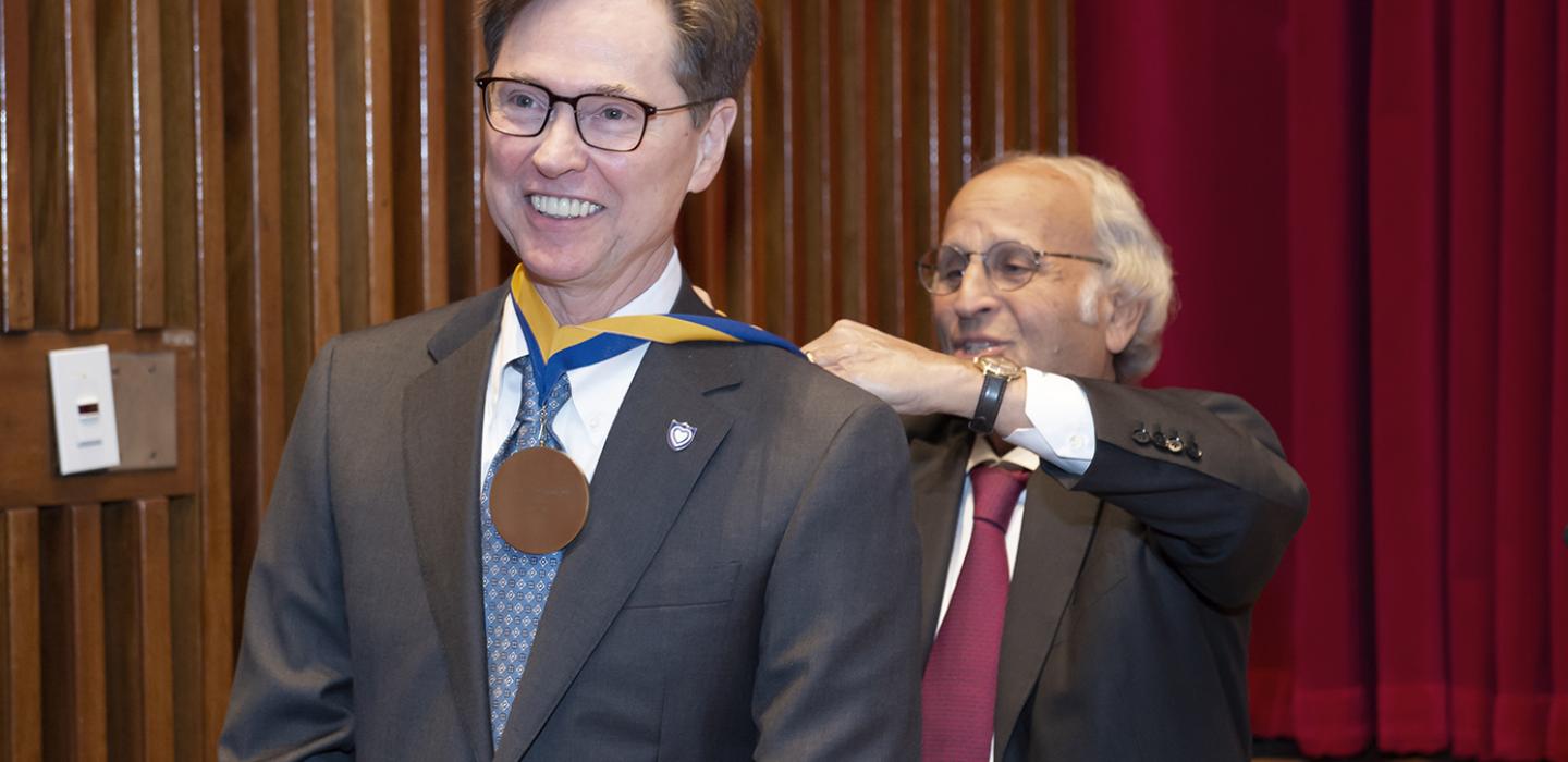 Terence Dermody receiving an award