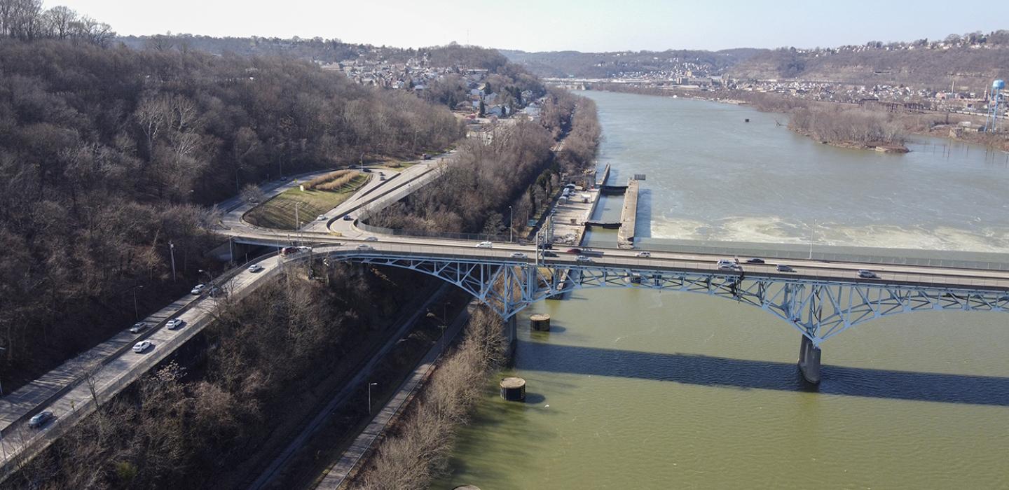 An aerial view of a bridge over a river