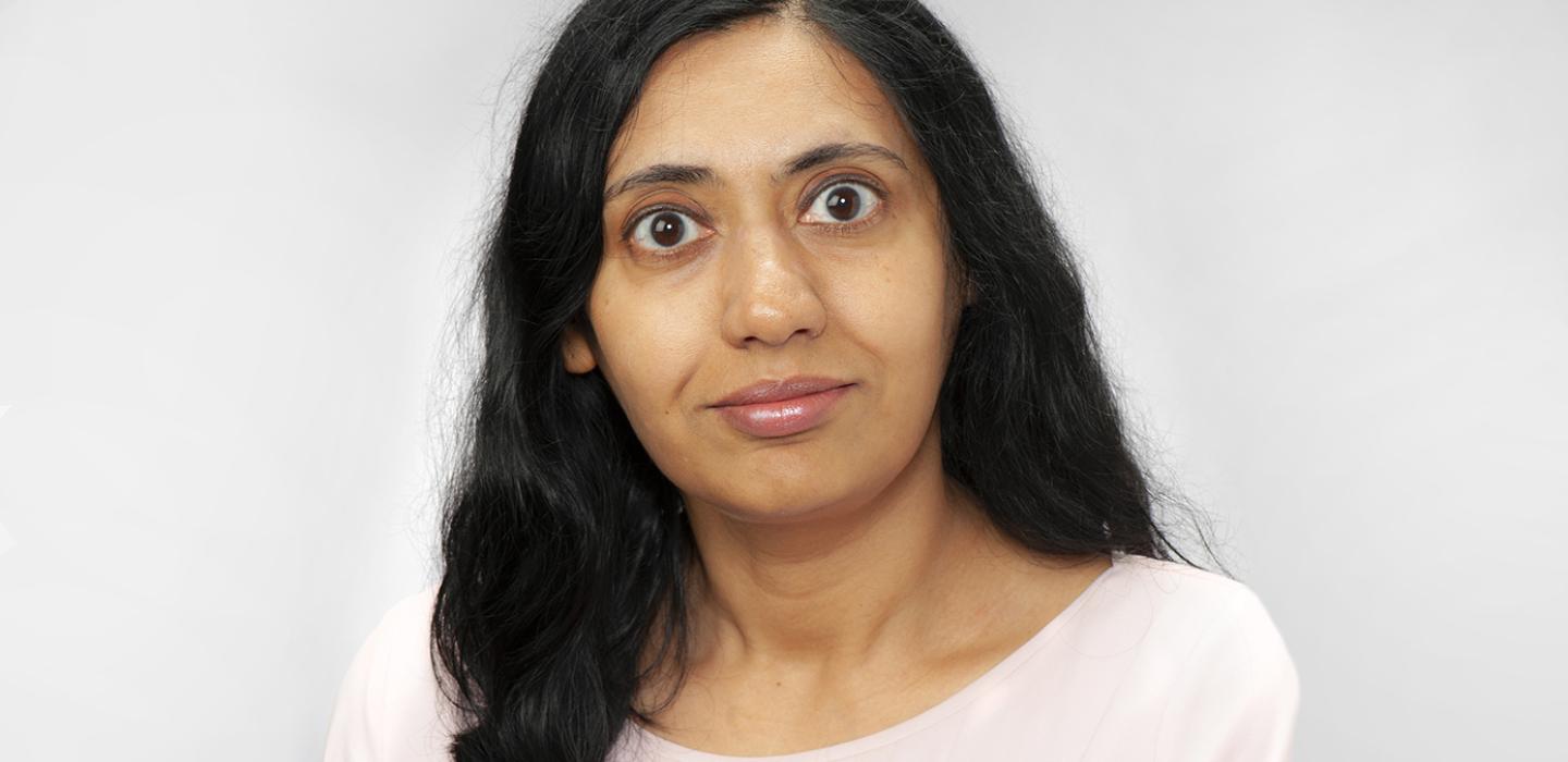 A woman in a white shirt