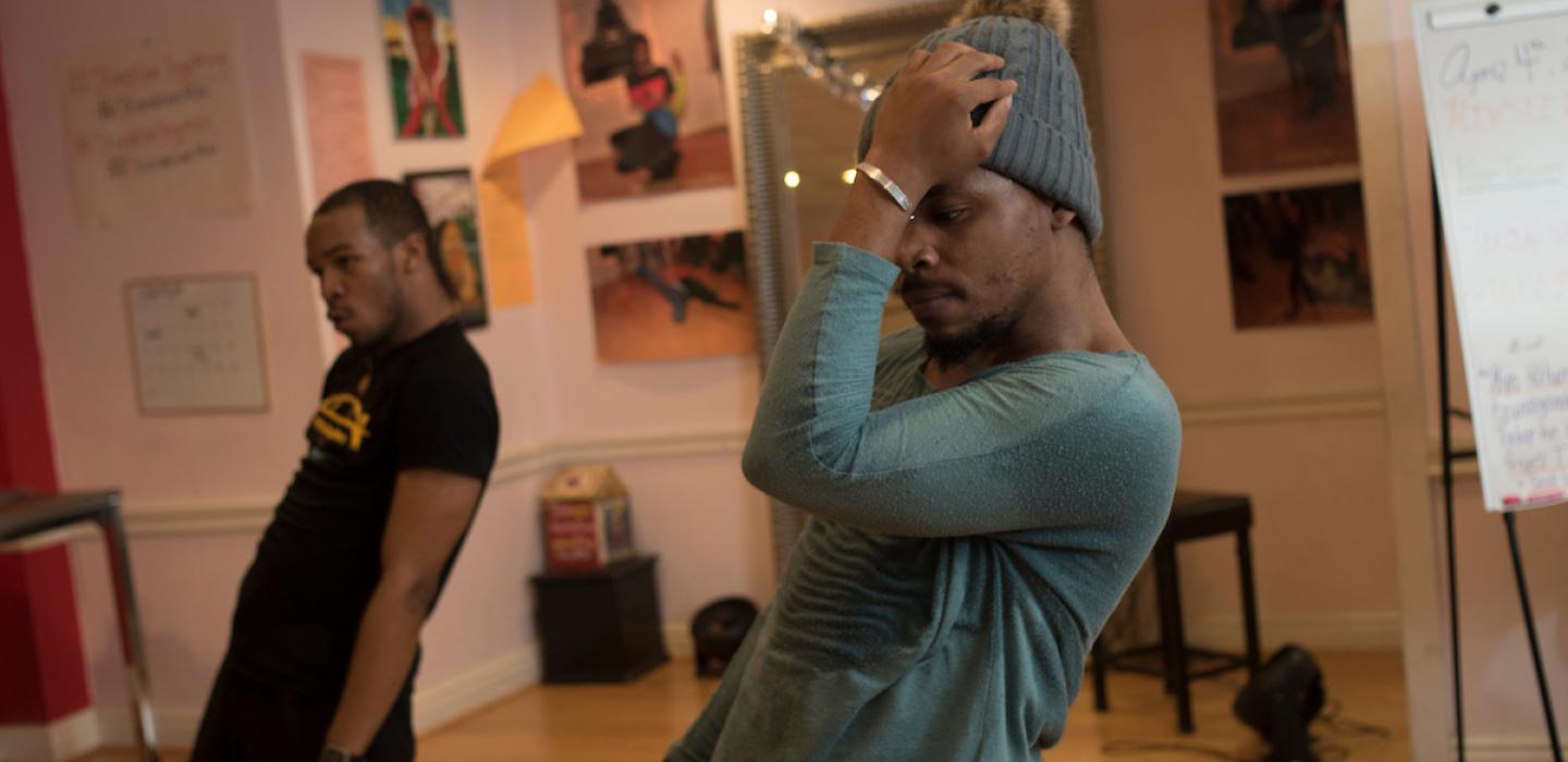 Two men vogueing