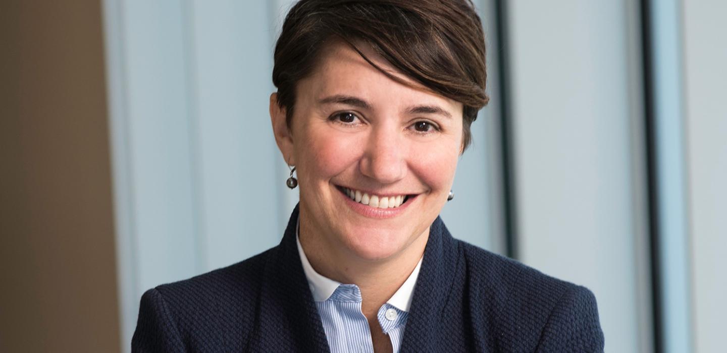 Carissa Schively Slotterback in a blue jacket and light blue dress shirt