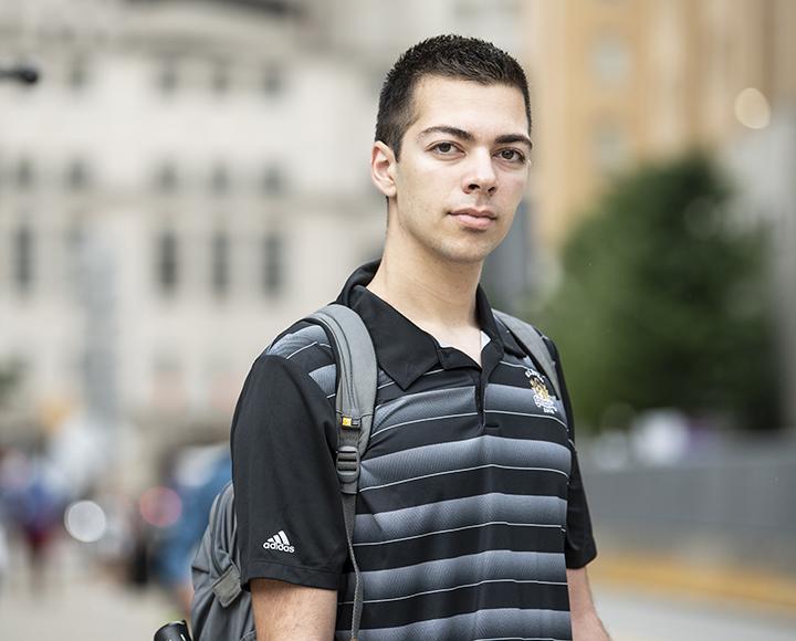 Mark Farino wearing black and grey polo shirt