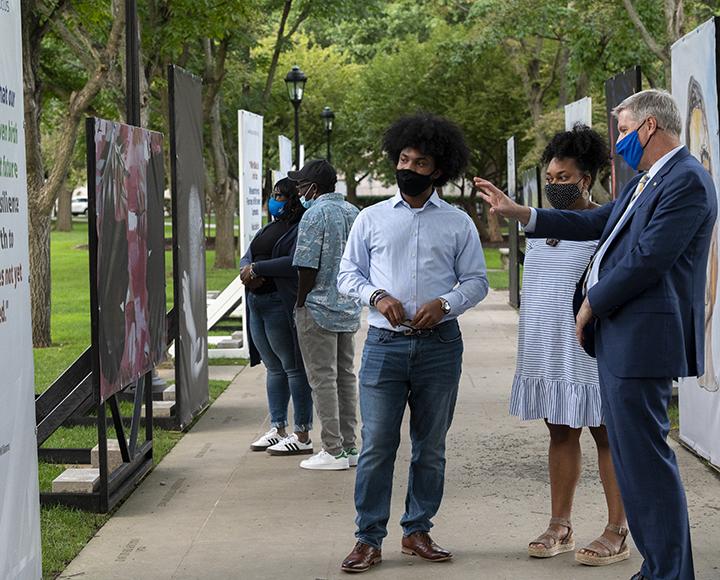 Jessica Vaden and Isaiah Spencer-Williams chat with Chancellor Patrick Gallagher