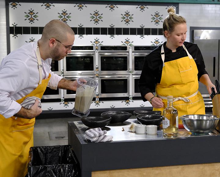 Brett Bankson with partner on Top Chef, using blender