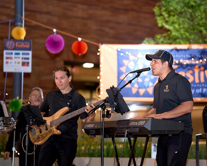 CLAS festival band, piano and guitar players performing