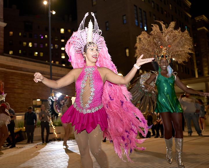 CLAS festival dancer with pink feathered outfit