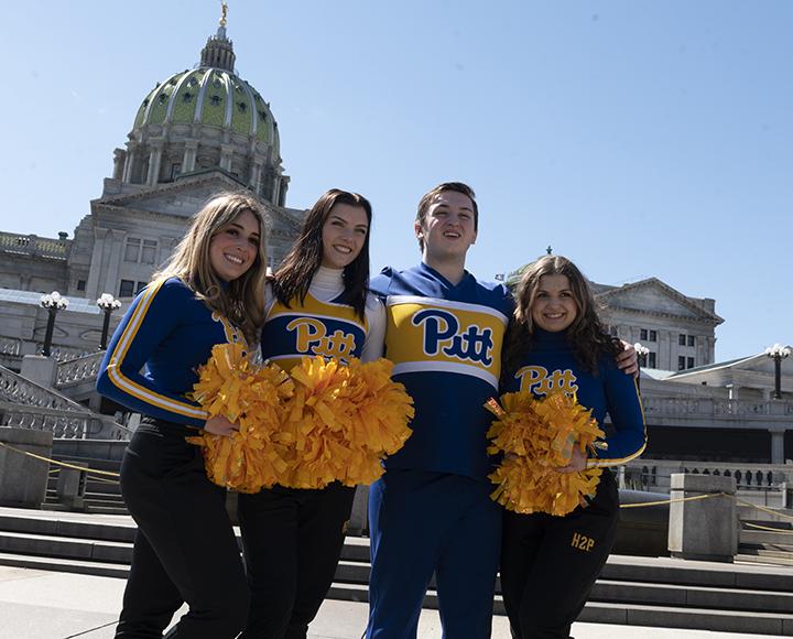 Pitt students posing in front of Capitol building in Harrisburg