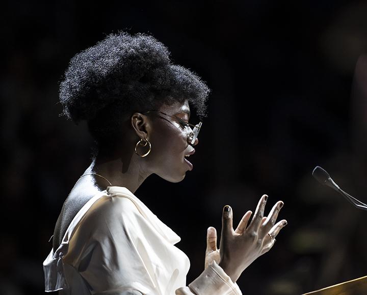 Danielle Obisie-Orlu speaking at podium during ceremony