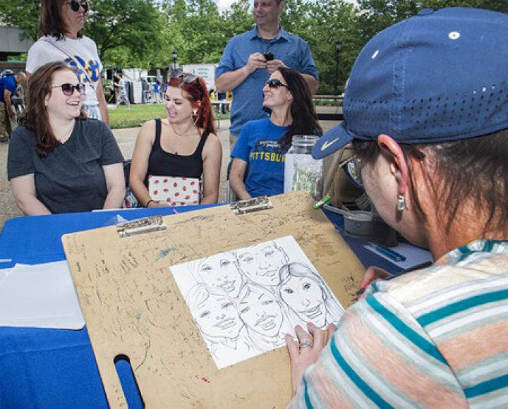 a cartoonist drawing people