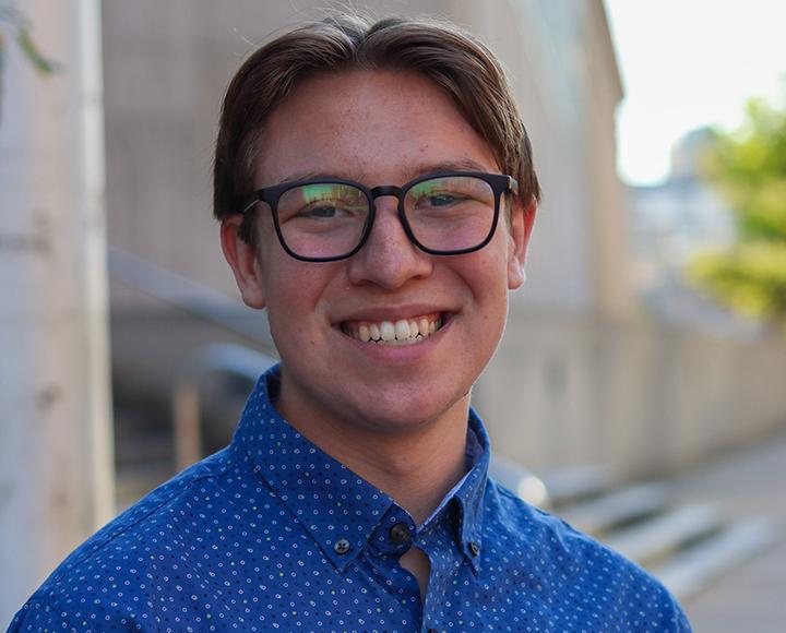 a student in a blue shirt