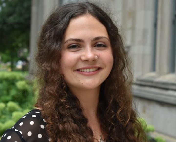 Ledermann in a spotted blouse near the Cathedral