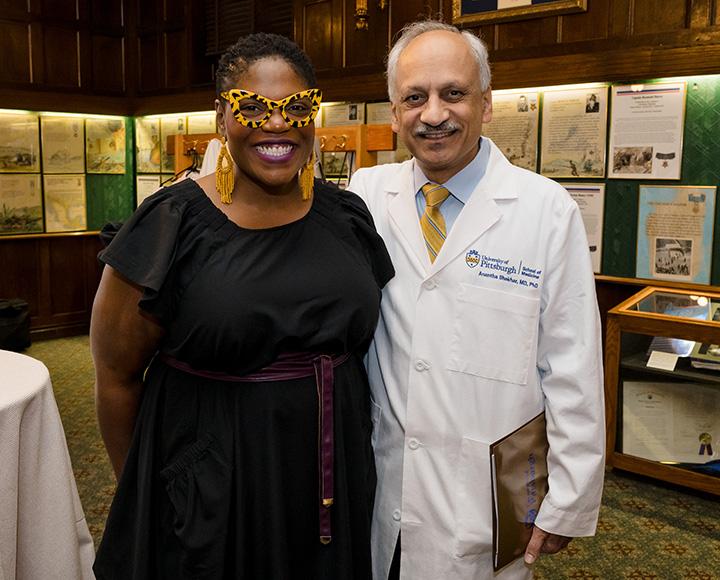 Ford-Dieng and Shekhar stand smiling