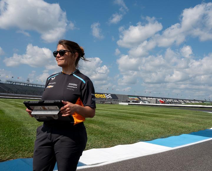 Gunlach stands on the Indianapolis Motor Speedway track