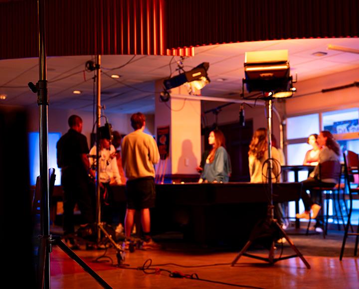 A film crew set up in Nordy's Place