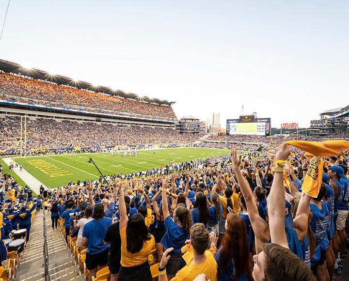 A crowd cheers in a packed Acrisure Stadium
