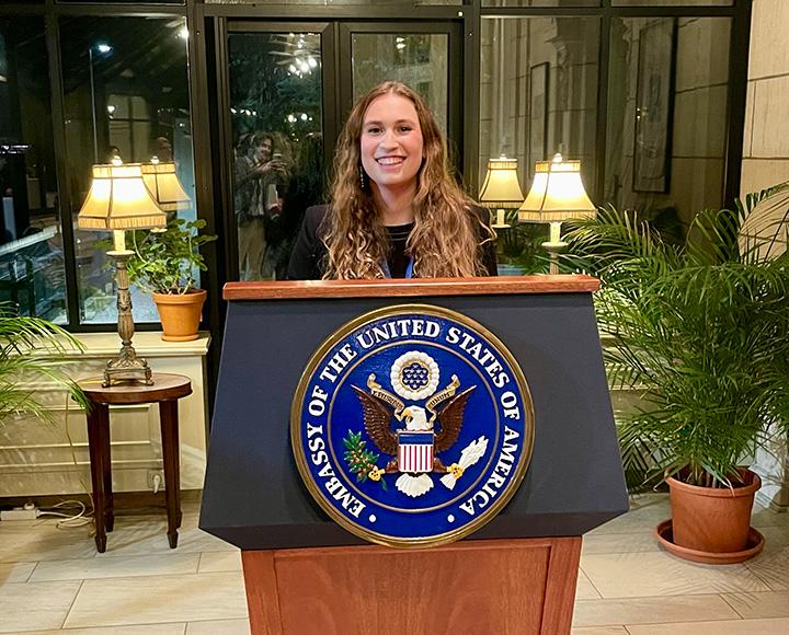 Furmansky stands at a U.S. Embassy podium