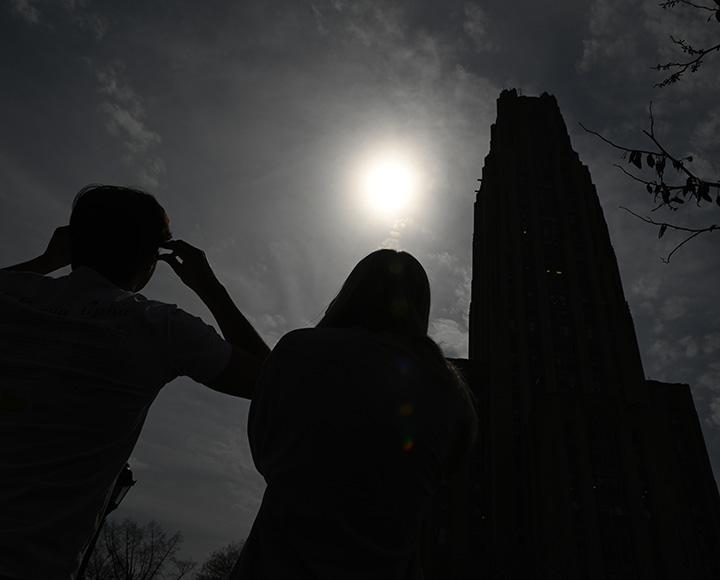 People look up at the eclipse