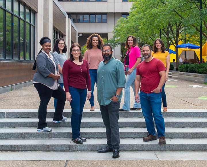 CuPID project team members pose for a photo on the stairs of Posvar Hall