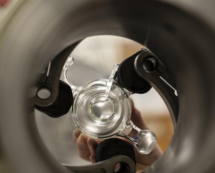 A piece of glass being rotated