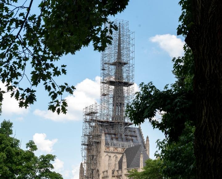 The spire of the Heinz Memorial Chapel is surrounded by scaffolding as it undergoes updates and renovations.
