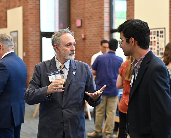 Hornyak talks with a Pitt-Greensburg student
