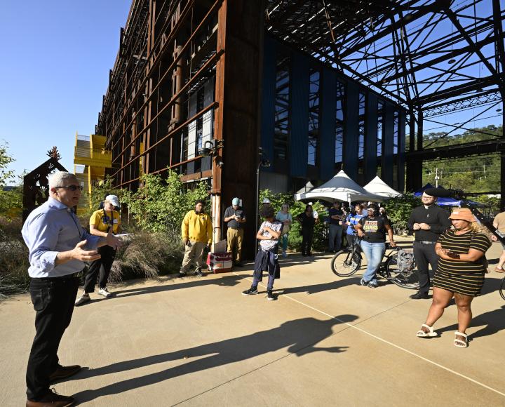 Ken Gabriel speaks to a crowd at Mill 19