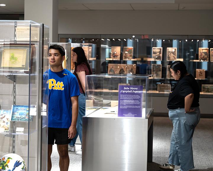 Students look through the archives