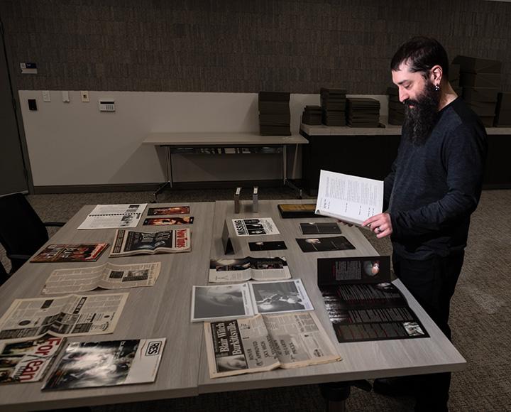Dan Rubin looks over materials from “The Blair Witch Project”