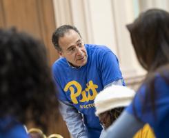 Man wearing Pitt shirt.